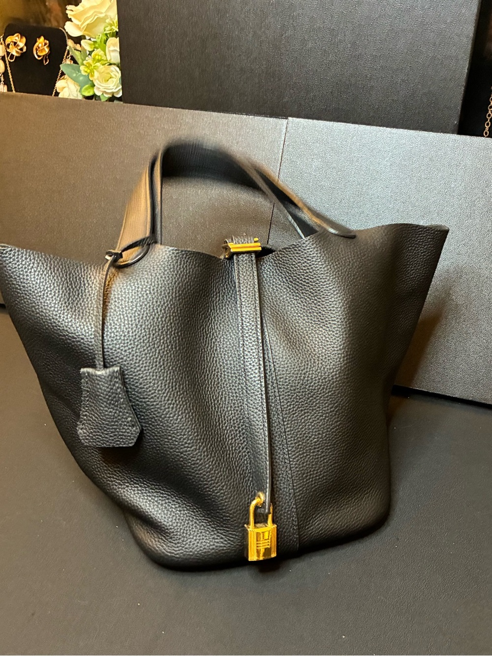Structured Black Pebbled Leather Tote with Gold Padlock Accent